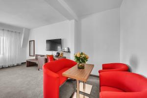 TV a/nebo společenská místnost v ubytování Hotel Nelly Kellys