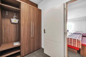 Postel nebo postele na pokoji v ubytování Hotel Nelly Kellys
