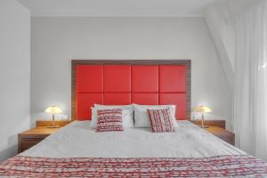 Postel nebo postele na pokoji v ubytování Hotel Nelly Kellys