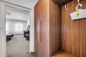 Postel nebo postele na pokoji v ubytování Hotel Nelly Kellys