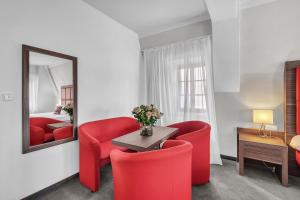 Posezení v ubytování Hotel Nelly Kellys
