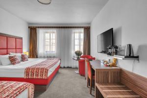 TV a/nebo společenská místnost v ubytování Hotel Nelly Kellys