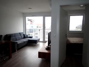 Ein Sitzbereich in der Unterkunft Apartment in the old town