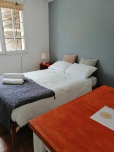 Cama o camas de una habitación en HOSTAL SUZI