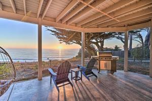 two chairs and a table on a porch with the ocean at Cliffside Pacifica Hideaway Unbeatable View! in Pacifica
