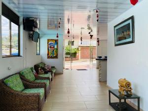 Posezení v ubytování Hotel Caribe La Vega
