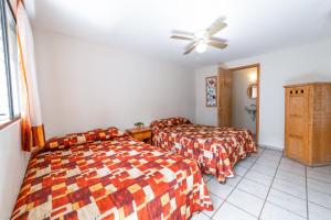 Llit o llits en una habitació de Hotel Meson de Isabel