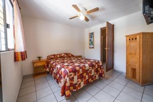 Postel nebo postele na pokoji v ubytování Hotel Meson de Isabel