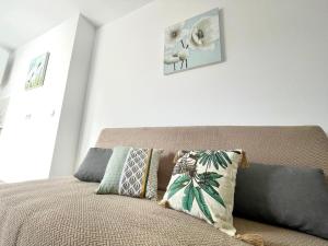 Posteľ alebo postele v izbe v ubytovaní Sol Apartamentos Centro Histórico