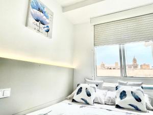 Posteľ alebo postele v izbe v ubytovaní Sol Apartamentos Centro Histórico