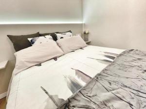 Posteľ alebo postele v izbe v ubytovaní Sol Apartamentos Centro Histórico