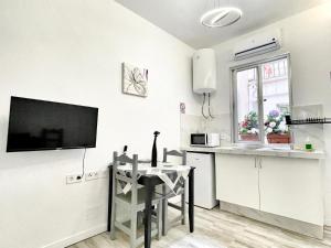 Kuchyňa alebo kuchynka v ubytovaní Sol Apartamentos Centro Histórico