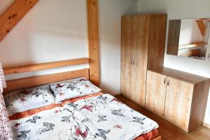Posteľ alebo postele v izbe v ubytovaní Chalupa Orlička
