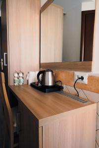 Kuchyň nebo kuchyňský kout v ubytování Square Inn