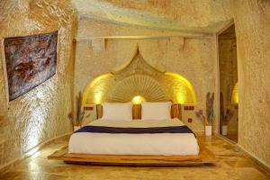 Letto o letti in una camera di The Calypso Cave