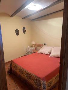 Łóżko lub łóżka w pokoju w obiekcie CASA RURAL SAN JULIAN