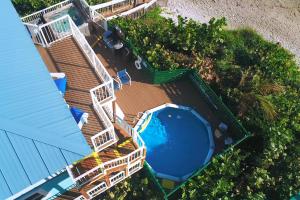 an overhead view of a swimming pool on a house at Heaven Can't Wait in Stuart