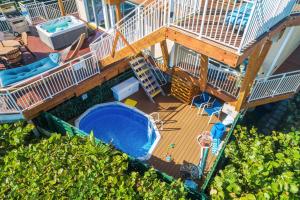 an overhead view of a deck and a swimming pool at Carpe Diem in Stuart