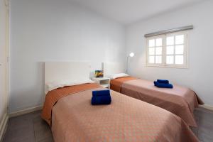 Postel nebo postele na pokoji v ubytování Lava Teneguia, 5 guests in 2 bedrooms