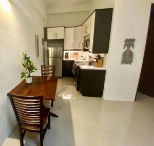 Kuchyň nebo kuchyňský kout v ubytování KASA The Lofts 302 + 7 fotografií
