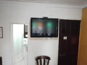 TV a/nebo společenská místnost v ubytování Hotel El Dorado La Candelaria + 9 fotografií