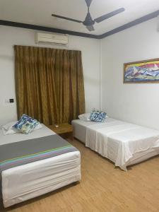 Letto o letti in una camera di Coco Cottage Local Style