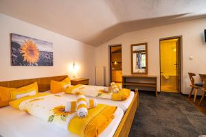 Postel nebo postele na pokoji v ubytování Haus Anton Sölden - Apartments & Zimmer