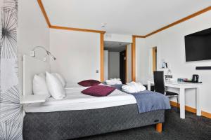 Postel nebo postele na pokoji v ubytování Best Western Kom Hotel Stockholm + 37 fotografií