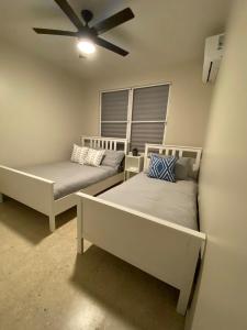 Postel nebo postele na pokoji v ubytování Casa Isabela En Cabo Rojo