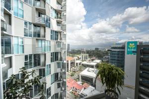 a view of a city from a building at San José Apt with Fantastic Views, Parking and Air Conditioning in San José