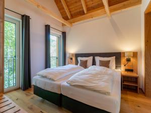 Tempat tidur dalam kamar di Mountain Chalet Alpinchique