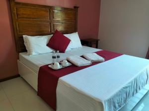Postel nebo postele na pokoji v ubytování Answer hotel