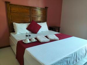 Postel nebo postele na pokoji v ubytování Answer hotel