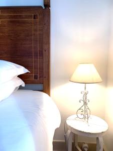 Cama ou camas em um quarto em Villa Margaridi
