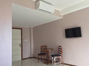 TV a/nebo společenská místnost v ubytování Answer hotel