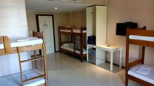 Postel nebo postele na pokoji v ubytování Answer hotel