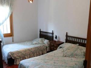 Posteľ alebo postele v izbe v ubytovaní Casa cerca del mar con piscina privada, wifi, aire acondicionado opcional y mascotas bienvenidas - ES-184-23