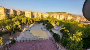 an aerial view of a park in a city at Room in an apartment in Granada