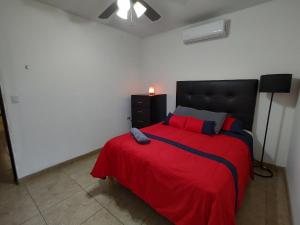 Säng eller sängar i ett rum på La Quinta Departamento Completo
