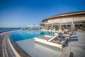 Bazén v ubytování Kagi Maldives Resort & Spa nebo v jeho okolí