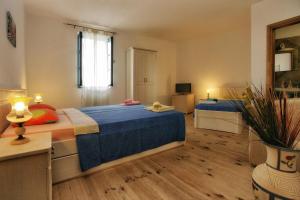 Voodi või voodid majutusasutuse B&B Apart Hotel Paštrovski Konak toas