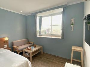 Postel nebo postele na pokoji v ubytování 純粹Home 民宿