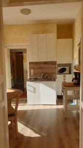 Kuchyň nebo kuchyňský kout v ubytování Appartement Harrer