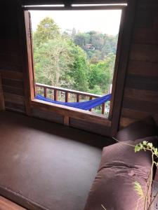 Balkoni atau teres di Mae Chan Treehouse with swimming pool