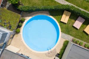 Bazén v ubytování Hotel De Maretak nebo v jeho okolí