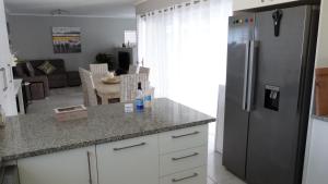 Kuchyň nebo kuchyňský kout v ubytování Settle inn Self Catering Units