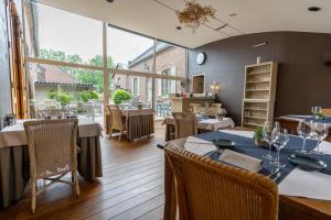 Posezení v ubytování Hotel De Maretak