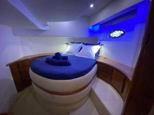 Posteľ alebo postele v izbe v ubytovaní Yacht le Yauta Porto Vecchio
