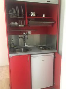 A kitchen or kitchenette at AKTES PIERIAS (GARDEN ROOMS)