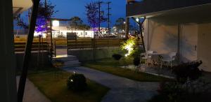 A garden outside AKTES PIERIAS (GARDEN ROOMS)